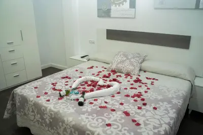 Cama o camas de una habitación en Hostal Goyesco Plaza