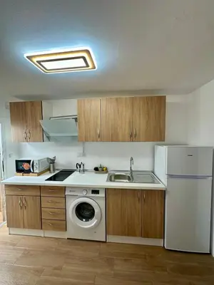 Una cocina o zona de cocina en Apartamento Rei Center