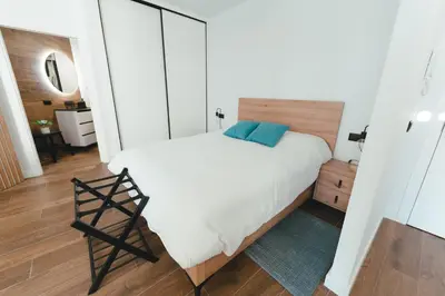Cama o camas de una habitación en Macarena Suites - Centro Histórico con Parking gratis