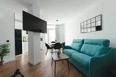 Una televisión o centro de entretenimiento en Macarena Suites - Centro Histórico con Parking gratis
