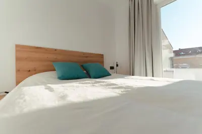 Cama o camas de una habitación en Macarena Suites - Centro Histórico con Parking gratis