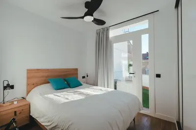 Cama o camas de una habitación en Macarena Suites - Centro Histórico con Parking gratis