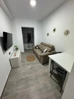 Una televisión o centro de entretenimiento en Apartamento Martina 2