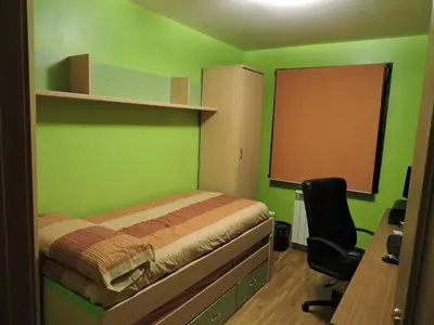 Cama o camas de una habitación en Vivienda El Almenar