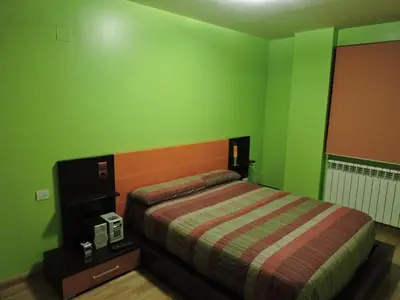 Cama o camas de una habitación en Vivienda El Almenar