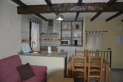 Una cocina o zona de cocina en Las Casitas Del Bodegon