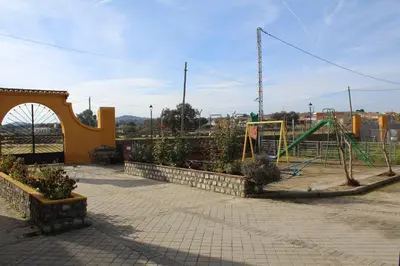 Zona de juegos infantil en AT El rincón de Bohonal
