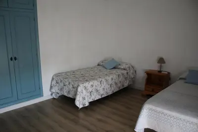 Cama o camas de una habitación en AT El rincón de Bohonal