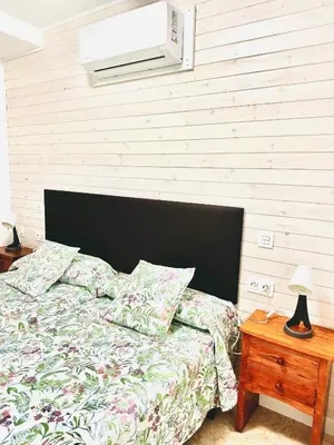 Cama o camas de una habitación en Hostal La Taberna