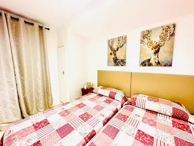 Cama o camas de una habitación en Hostal La Taberna