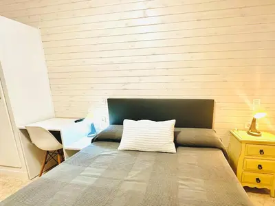 Cama o camas de una habitación en Hostal La Taberna