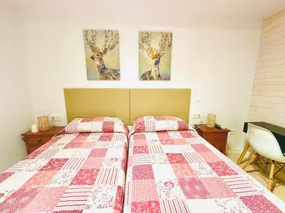Cama o camas de una habitación en Hostal La Taberna