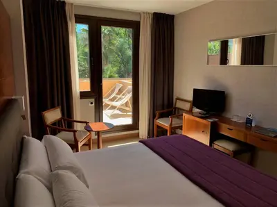 Cama o camas de una habitación en Hotel Balneario Valle del Jerte