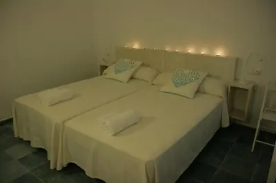 Cama o camas de una habitación en Casa Rural La Dehesa de Campoviejo
