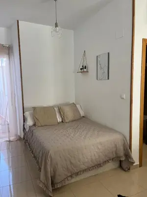Cama o camas de una habitación en Estudio zona residencial