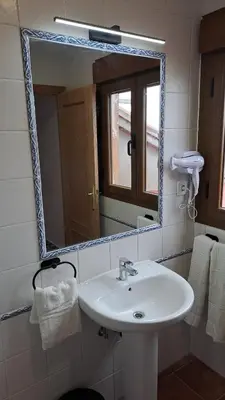 Un baño de Hostal LA SIERRA