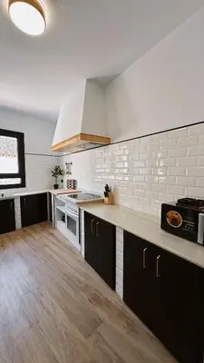Una cocina o zona de cocina en La Casa del Escudo