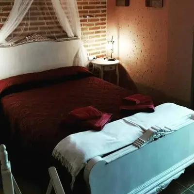 Cama o camas de una habitación en Casa Rural El Corral de la Antigua