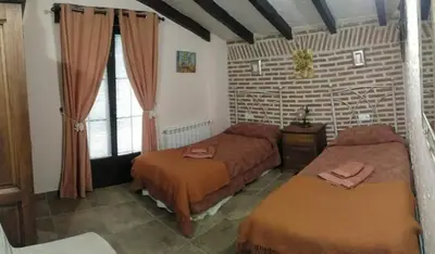 Cama o camas de una habitación en Casa Rural El Corral de la Antigua