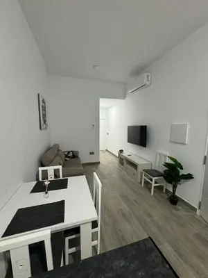 Una televisión o centro de entretenimiento en Apartamento Martina 1