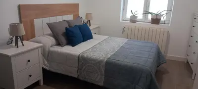 Cama o camas de una habitación en La Estrella Del Carmelo