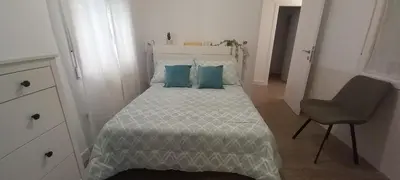Cama o camas de una habitación en La Estrella Del Carmelo