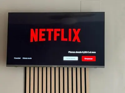 Una televisión o centro de entretenimiento en Apartamento Turístico El Canalizo II