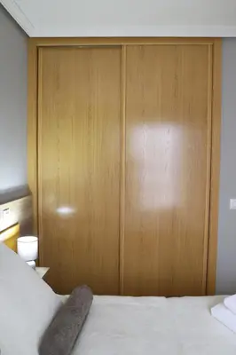 Cama o camas de una habitación en Apartamento Turístico El Canalizo II