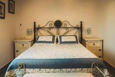 Cama o camas de una habitación en Apartamentos Rurales La Fatela