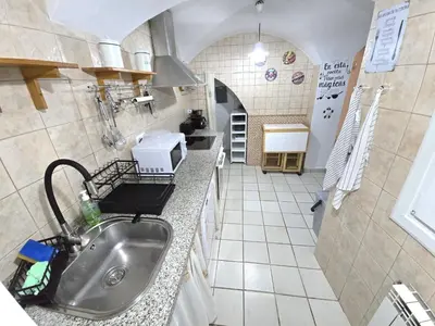 Una cocina o zona de cocina en LA MORADA DEL MAESTRE