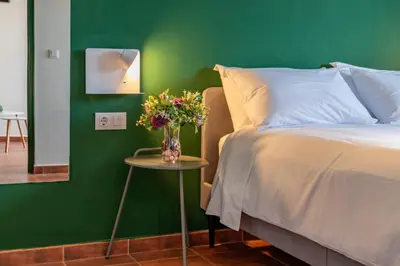 Cama o camas de una habitación en Apartamentos BICO DE NONA