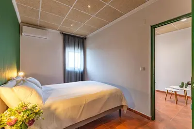 Cama o camas de una habitación en Apartamentos BICO DE NONA