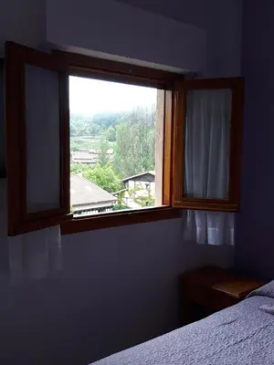 Cama o camas de una habitación en Hostal Rural El Campito