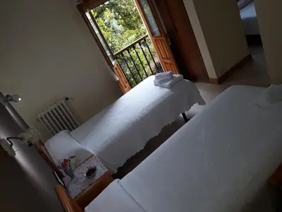 Cama o camas de una habitación en Hostal Rural El Campito