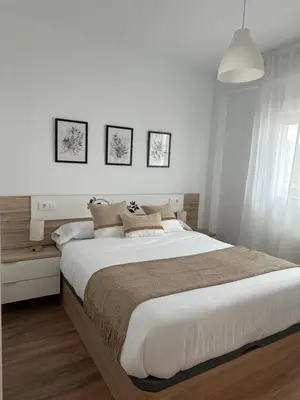 Cama o camas de una habitación en VYL Béjar