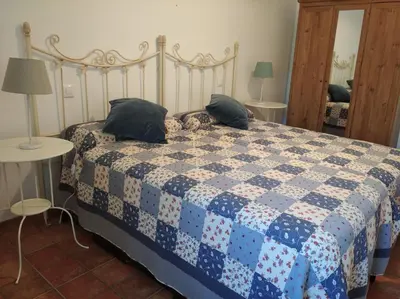 Cama o camas de una habitación en El Huerto de Pipo
