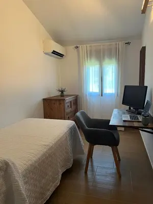 Cama o camas de una habitación en Casa Rural Alegría