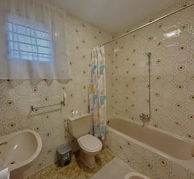 Un baño de Apartamentos Turísticos Cardelemin