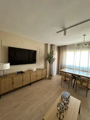 Una televisión o centro de entretenimiento en VuT IDESIGN 3