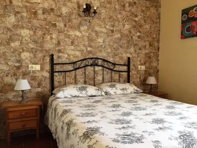 Cama o camas de una habitación en La Casita del Alberche
