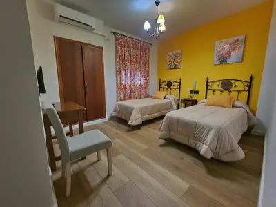 Cama o camas de una habitación en HOSTAl LUJUAN