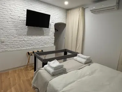 Cama o camas de una habitación en La Pata Suites
