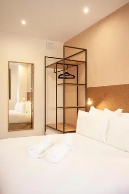 Cama o camas de una habitación en Nova Suite