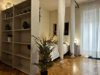 Una televisión o centro de entretenimiento en Apartamento Caldereros con Parking gratis