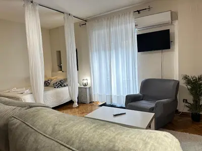 Una televisión o centro de entretenimiento en Apartamento Caldereros con Parking gratis