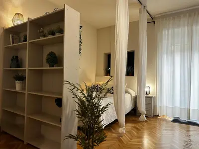 Una televisión o centro de entretenimiento en Apartamento Caldereros con Parking gratis