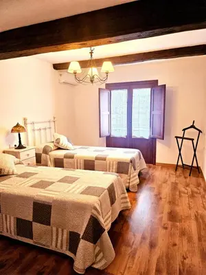 Cama o camas de una habitación en La Casa de Sofía