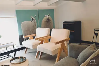 Zona de estar de Apartamentos Al-Karika