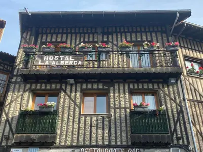 Un balcón o terraza de Hostal La Alberca