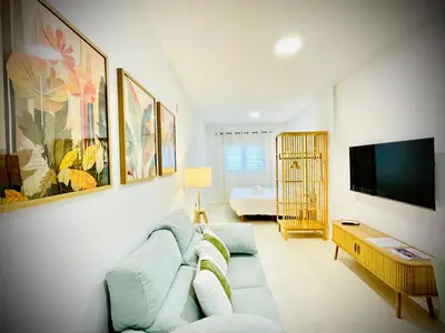 Una televisión o centro de entretenimiento en Apartamentos Guerrero